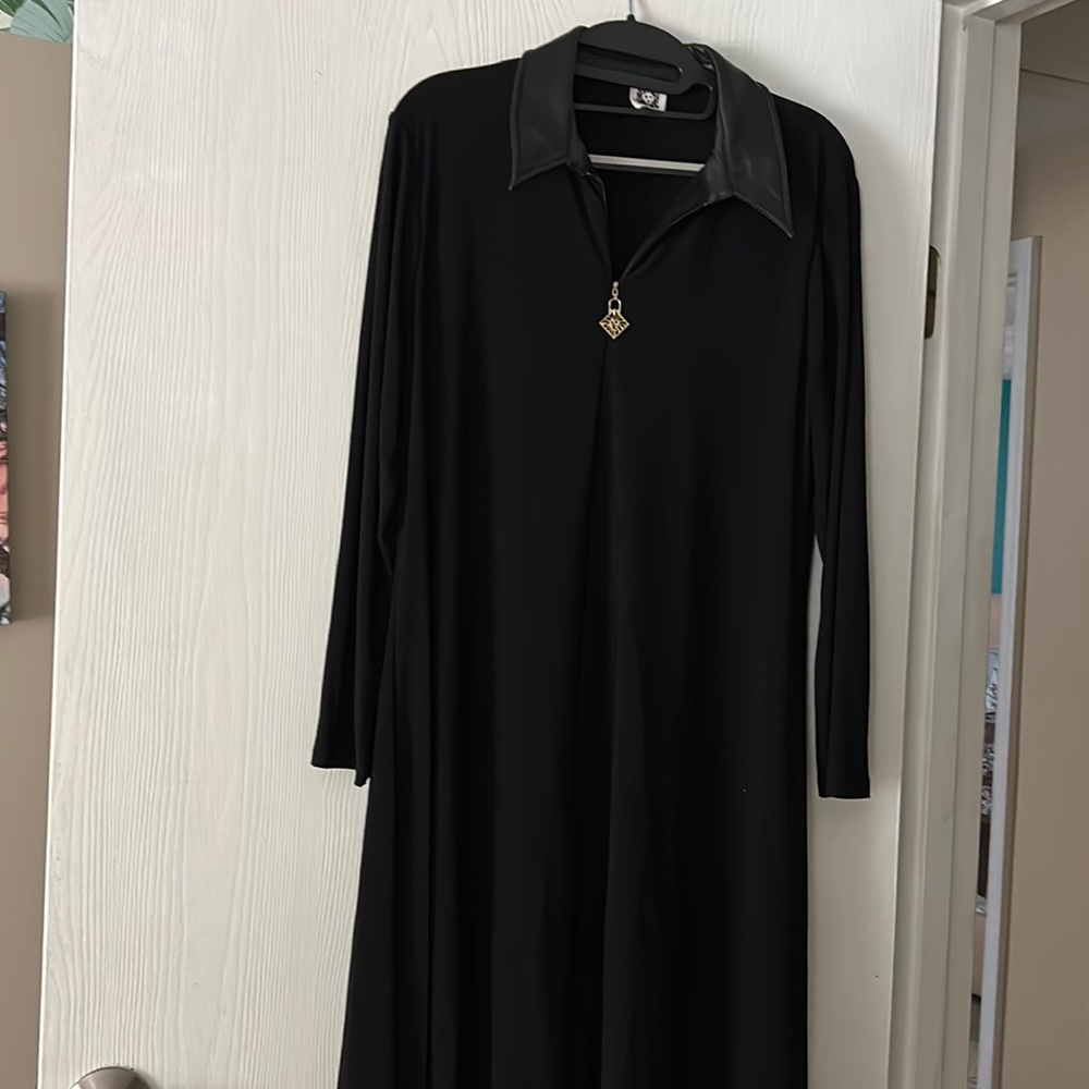 New no tags cute black dress by Anne Kline with a faux collar .  Measures 17”